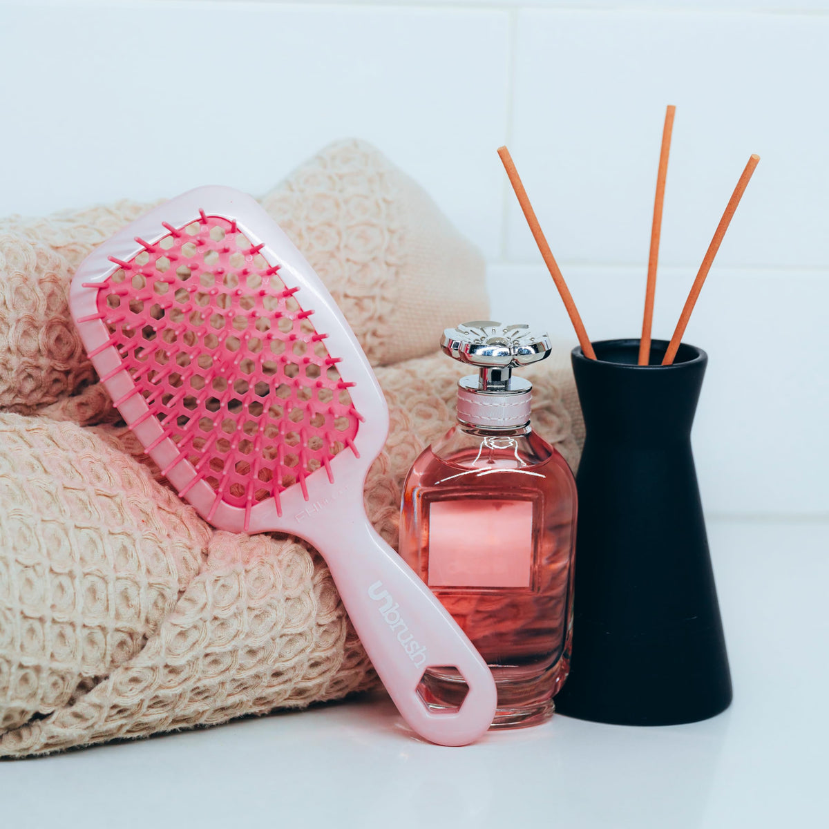 FHI Heat UNbrush Detangling Brush with packaging displayed