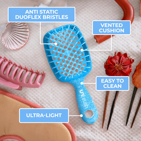 FHI Heat UNbrush Mini Detangling Brush with wet hair