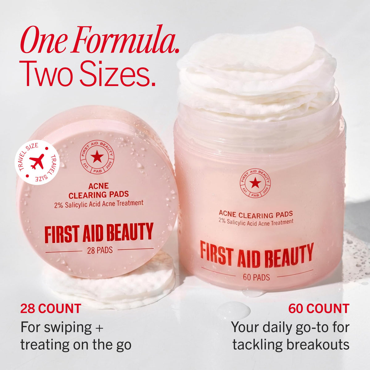 First Aid Beauty Acne Pads in hand