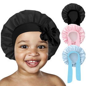FIRSTPELLA Kids Silk Bonnets displayed with accessories