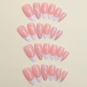 FJSMTOPl Almond Press On Nails displayed in packaging