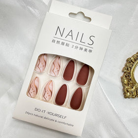 FJSMTOPl Almond Press on Nails displayed on a hand
