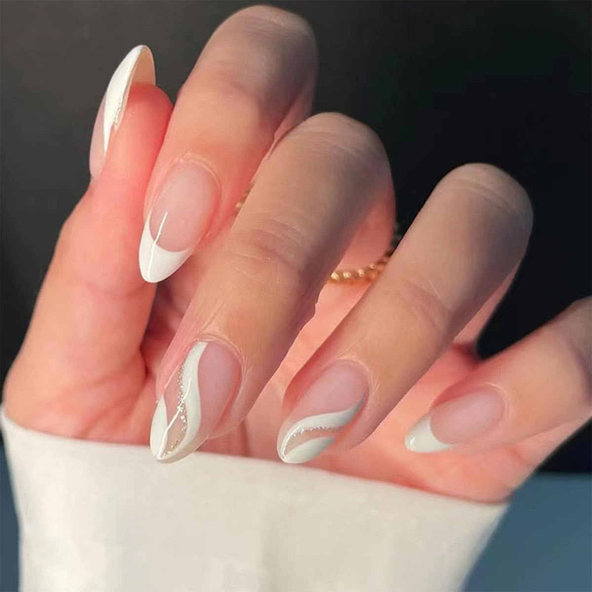 FJSMTOPl Almond Press on Nails white French tip front view