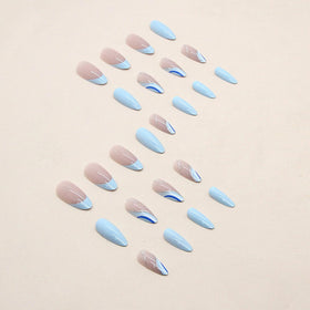 FJSMTOPl Blue Almond Press On Nails in use