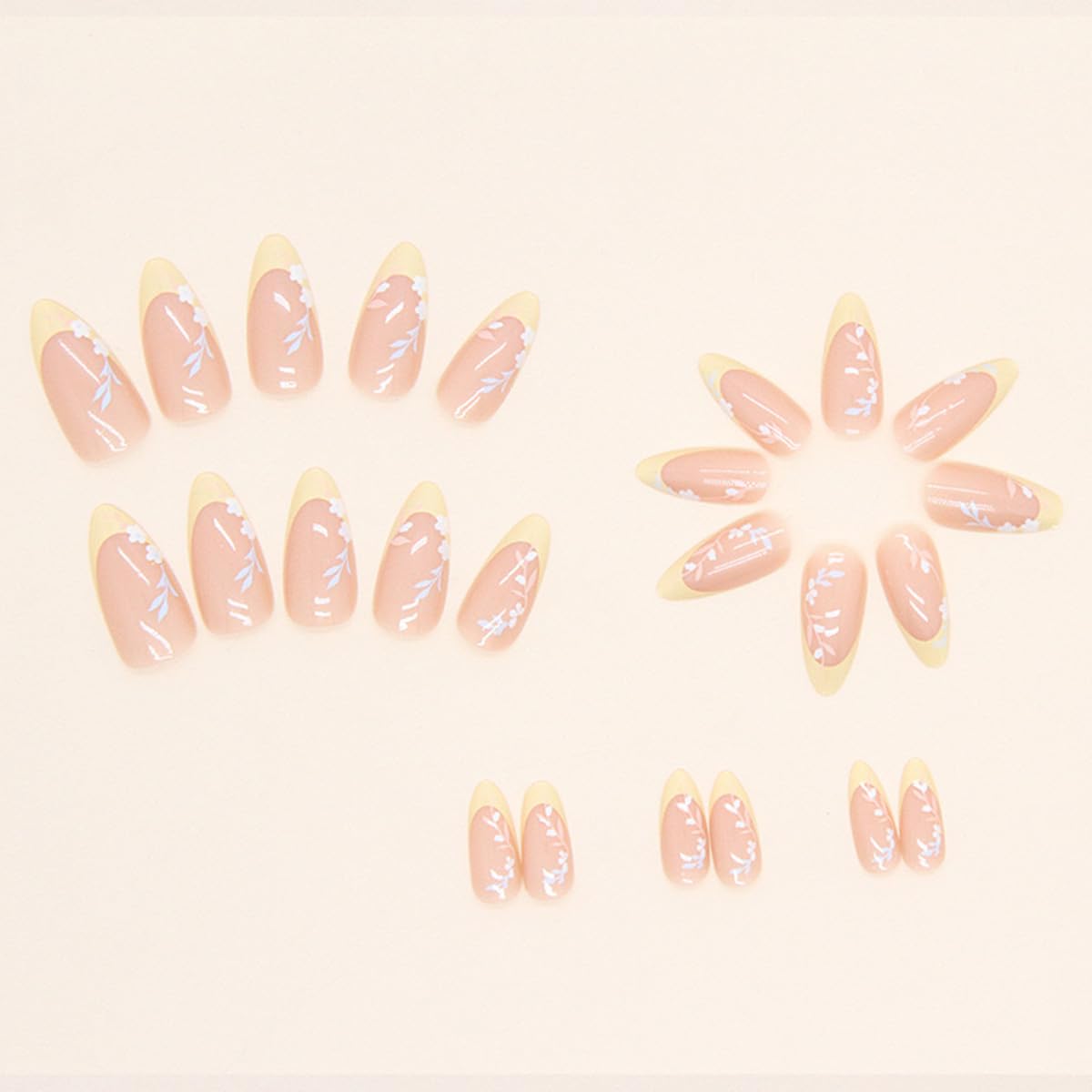 FJSMTOPl Flower Almond Press on Nails displayed on a table