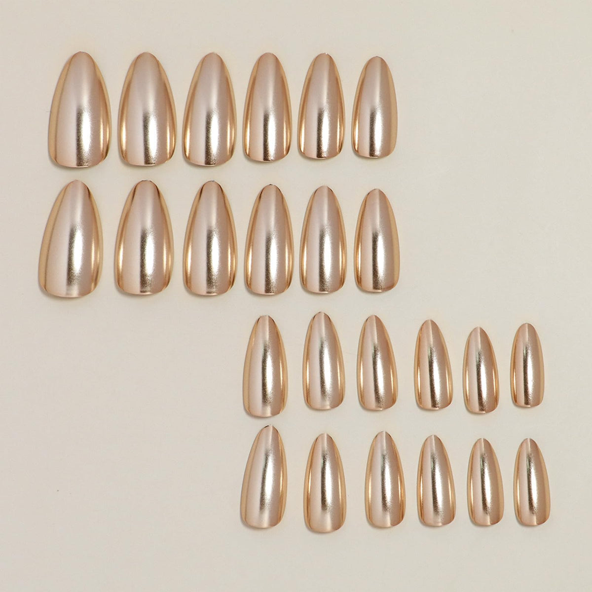 FJSMTOPl Gold Press on Nails applied on hands