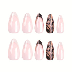 FJSMTOPl press on nails applied on a hand for a stylish look