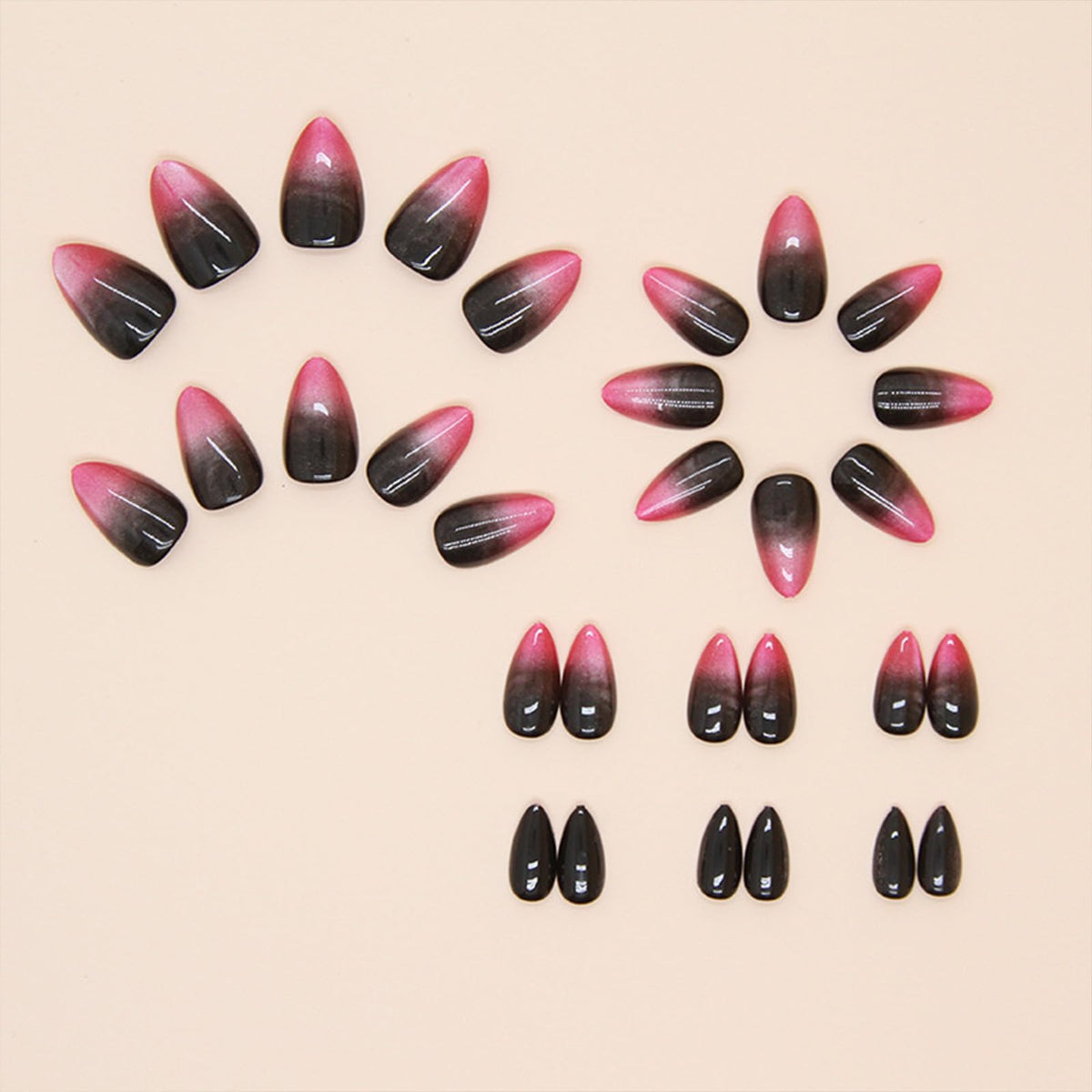 FJSMTOPl red almond nails displayed with nail file and wooden stick