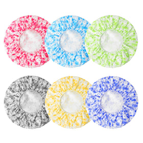 Flat lay of CHFONG shower caps arranged by colour