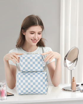 Flat lay of Narwey makeup pouch with various cosmetics