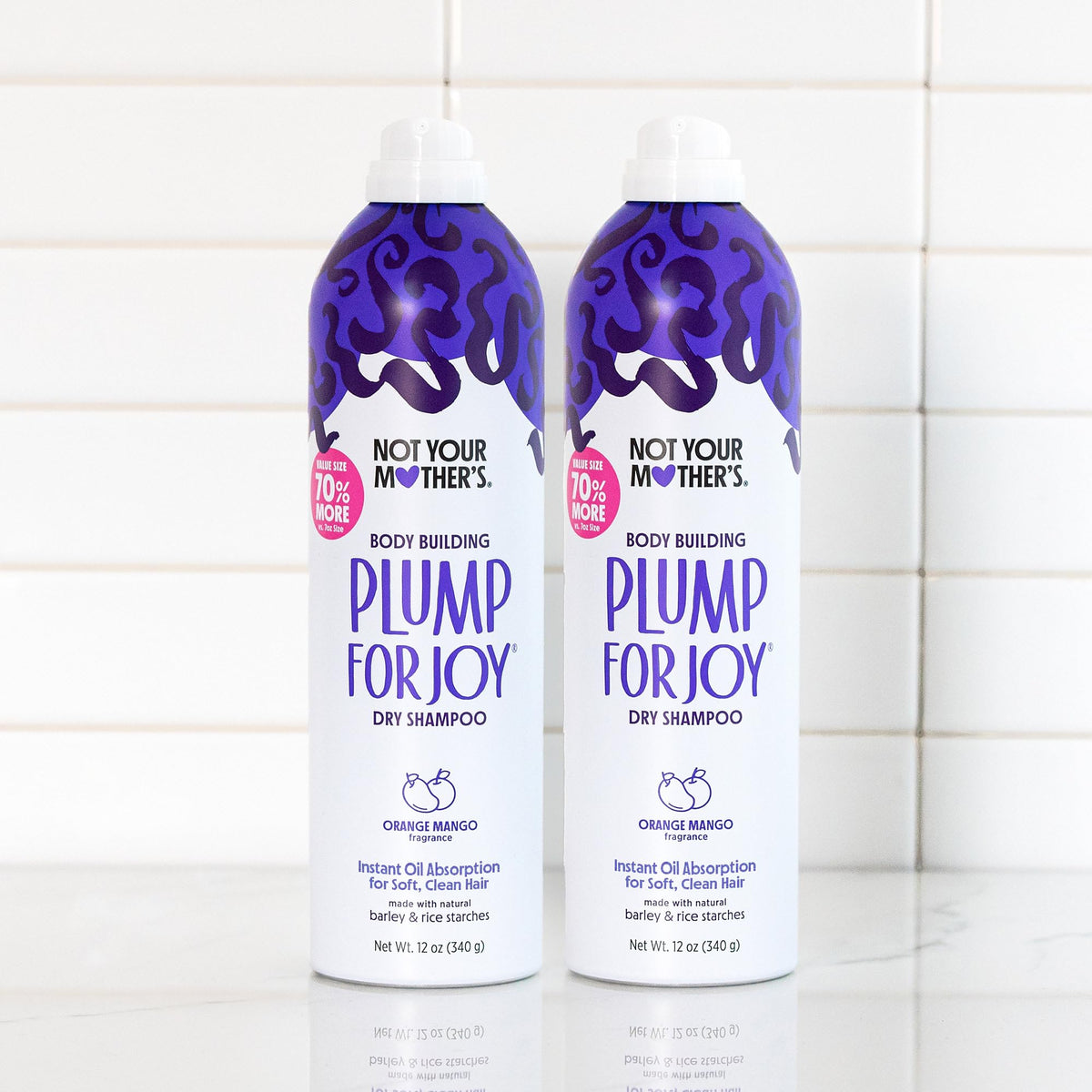 Flat lay of Not Your Mother's Jumbo Dry Shampoo with accessories