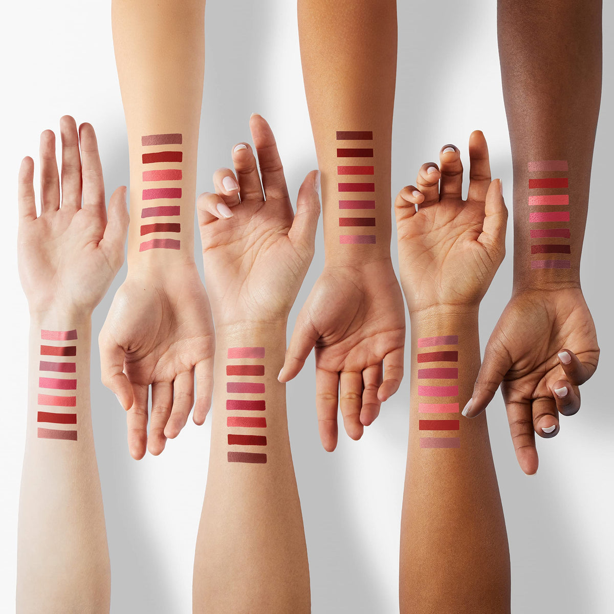 Flat lay of QiBest lipstick set with vibrant colours displayed