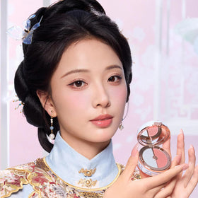 Flower Knows blush compact with gold accents and floral design