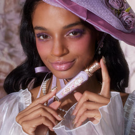 Flower Knows Rococo Glowy Lip Gloss swatch on skin