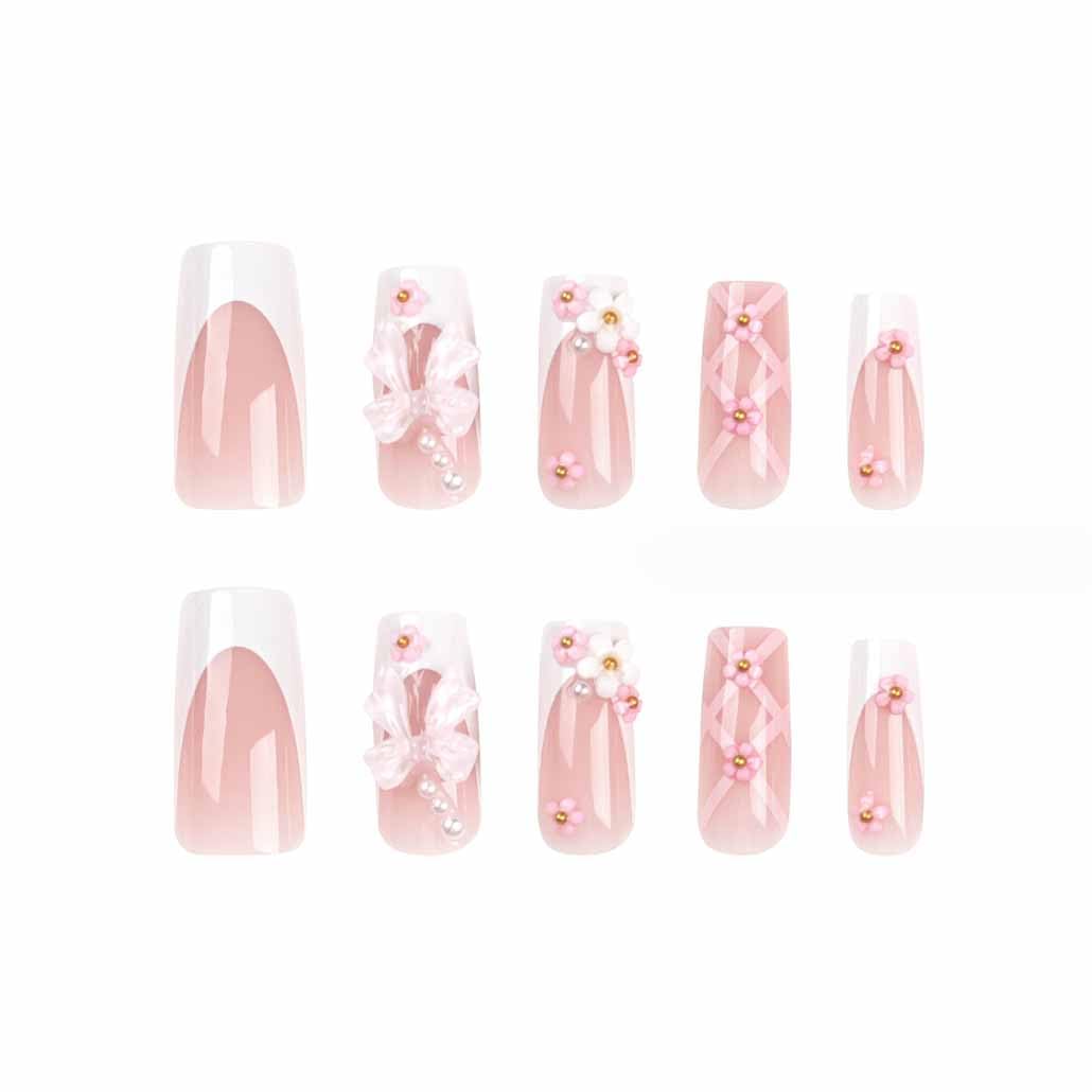 Foccna Press on Nails arranged with a nail file and adhesive tabs