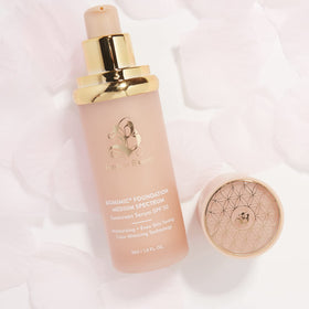 Forever Bloom Bio Mimic Foundation being applied with a sponge