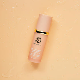 Forever Bloom Bio Mimic Foundation next to makeup brushes