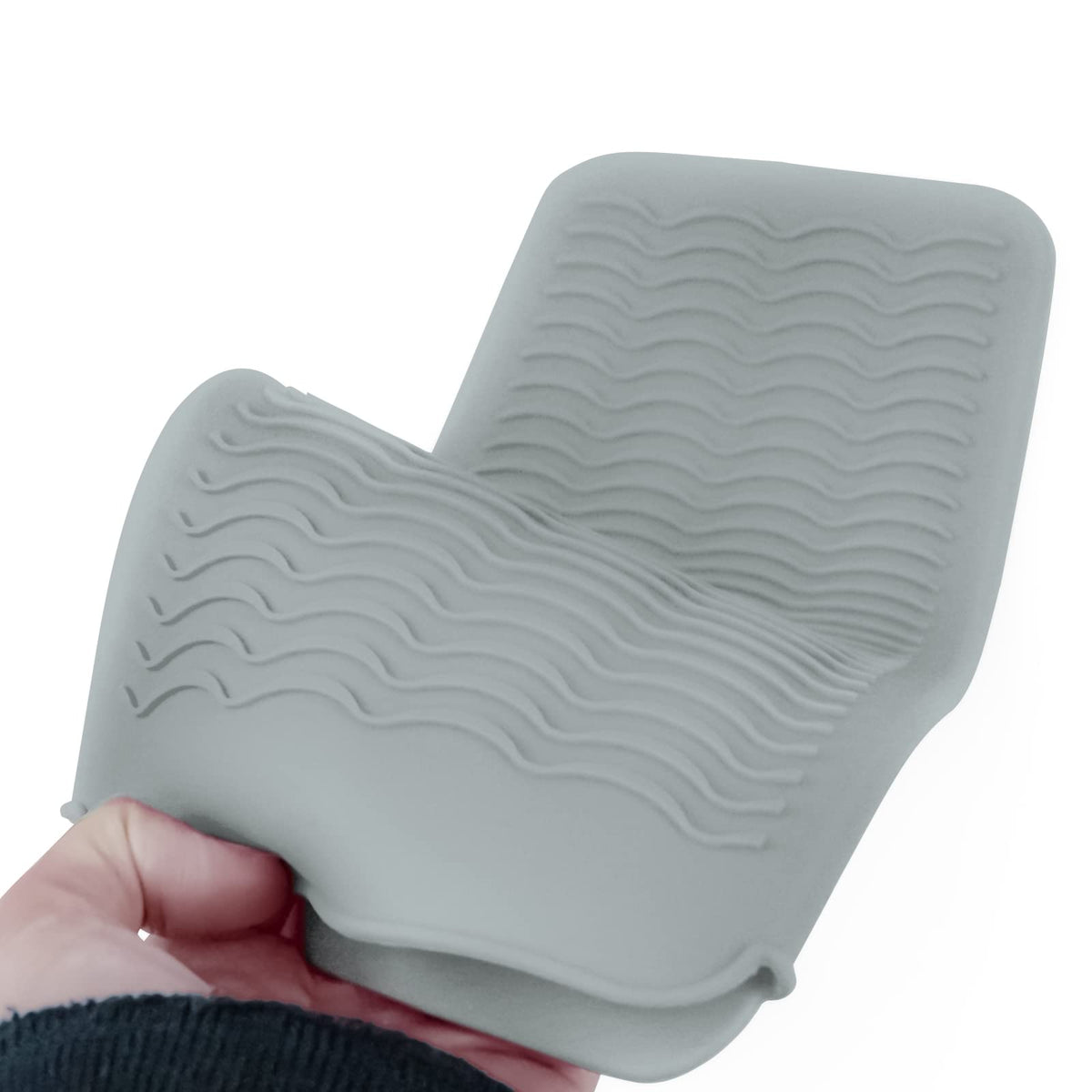 Fouews Silicone Heat Resistant Mat Pouch in use at a barbershop