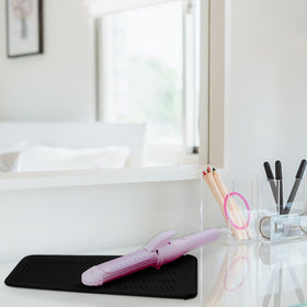 Fouews Silicone Heat Resistant Mat Pouch in use on a countertop