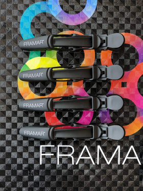 FRAMAR Gator Grips Black Hair Clips on a vanity