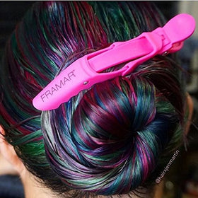 FRAMAR Gator Grips Pink Styling Hair Clips on a styling table