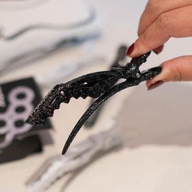 FRAMAR Glitter Hair Clip Set displayed on a counter