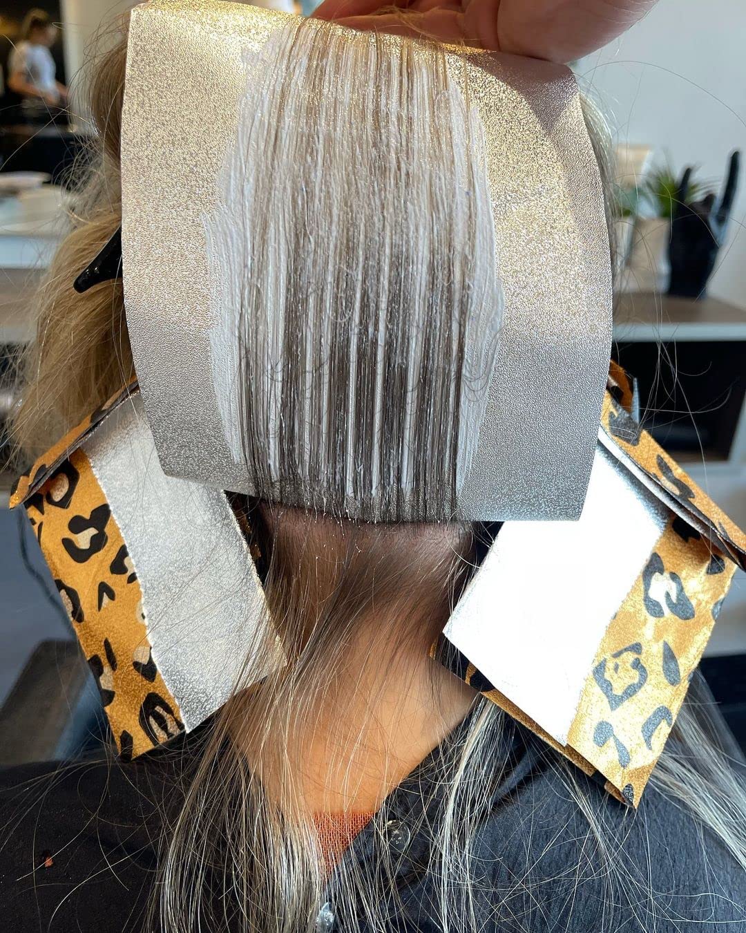 FRAMAR Party Animal Hair Foils Leopard design displayed on a salon station