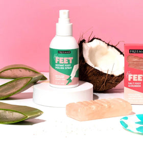 Freeman Flirty Feet Instant Foot Peeling Spray in use with exfoliating mitt