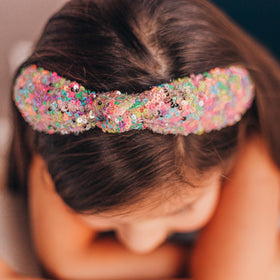 FROG SAC sparkling headband on a child's head