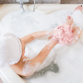 Fu Store Loofah Sponge in use during a shower