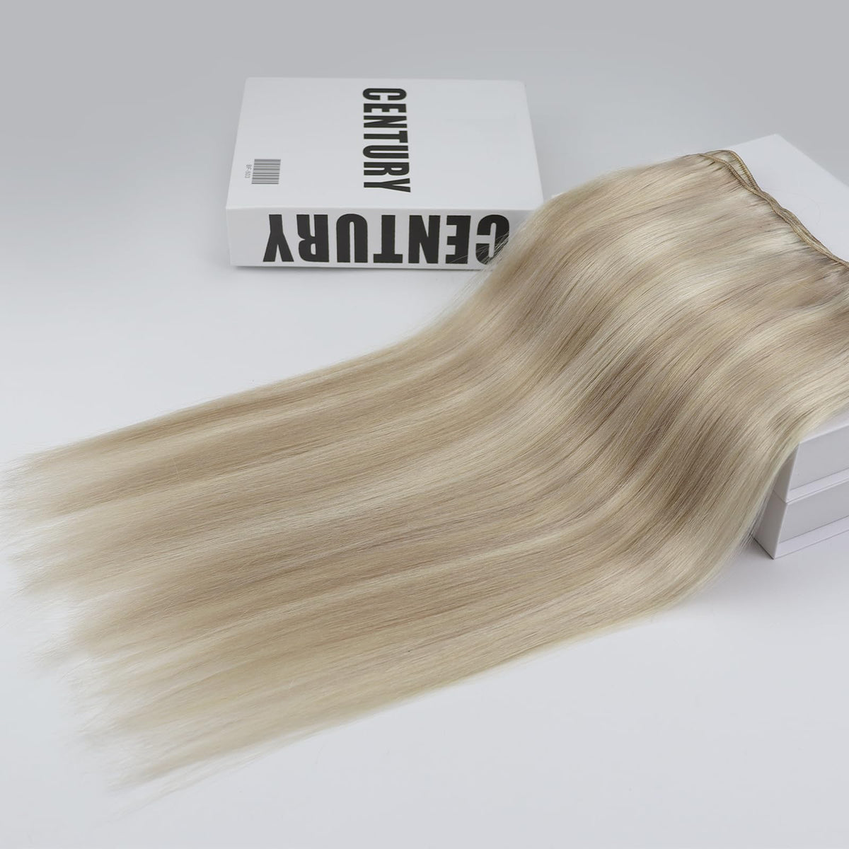 Full Shine 18 Inch Weft Hair Extensions Ash Platinum Blonde in a hair care setting