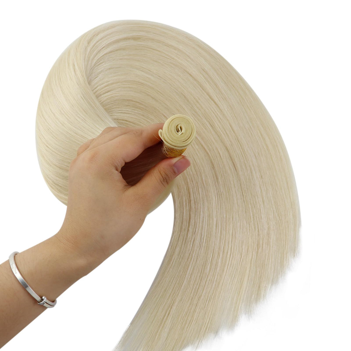 Full Shine Genius Weft Hair Extensions styled in a bun