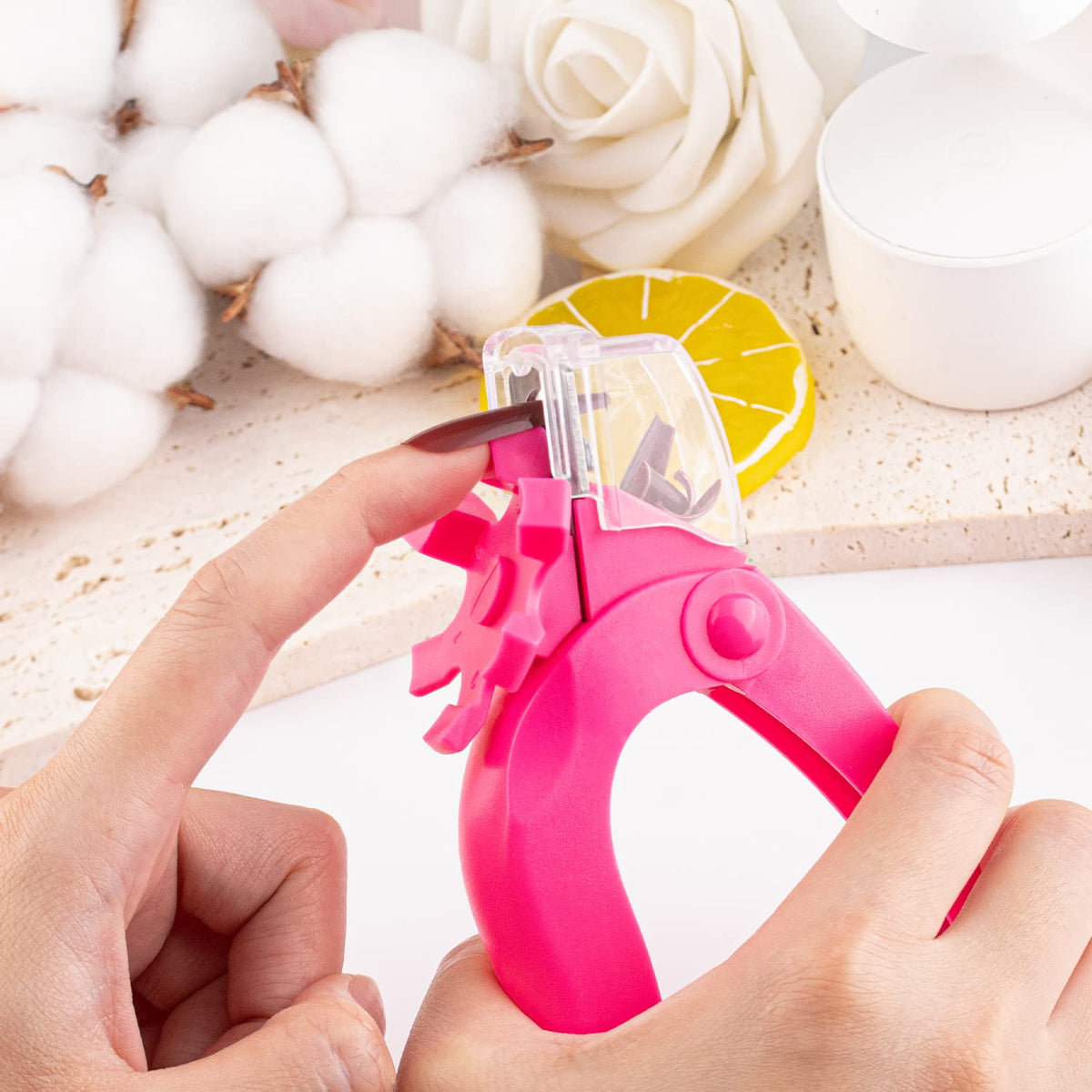 GA&EN Hot Pink Acrylic Nail Clipper in use on acrylic nails