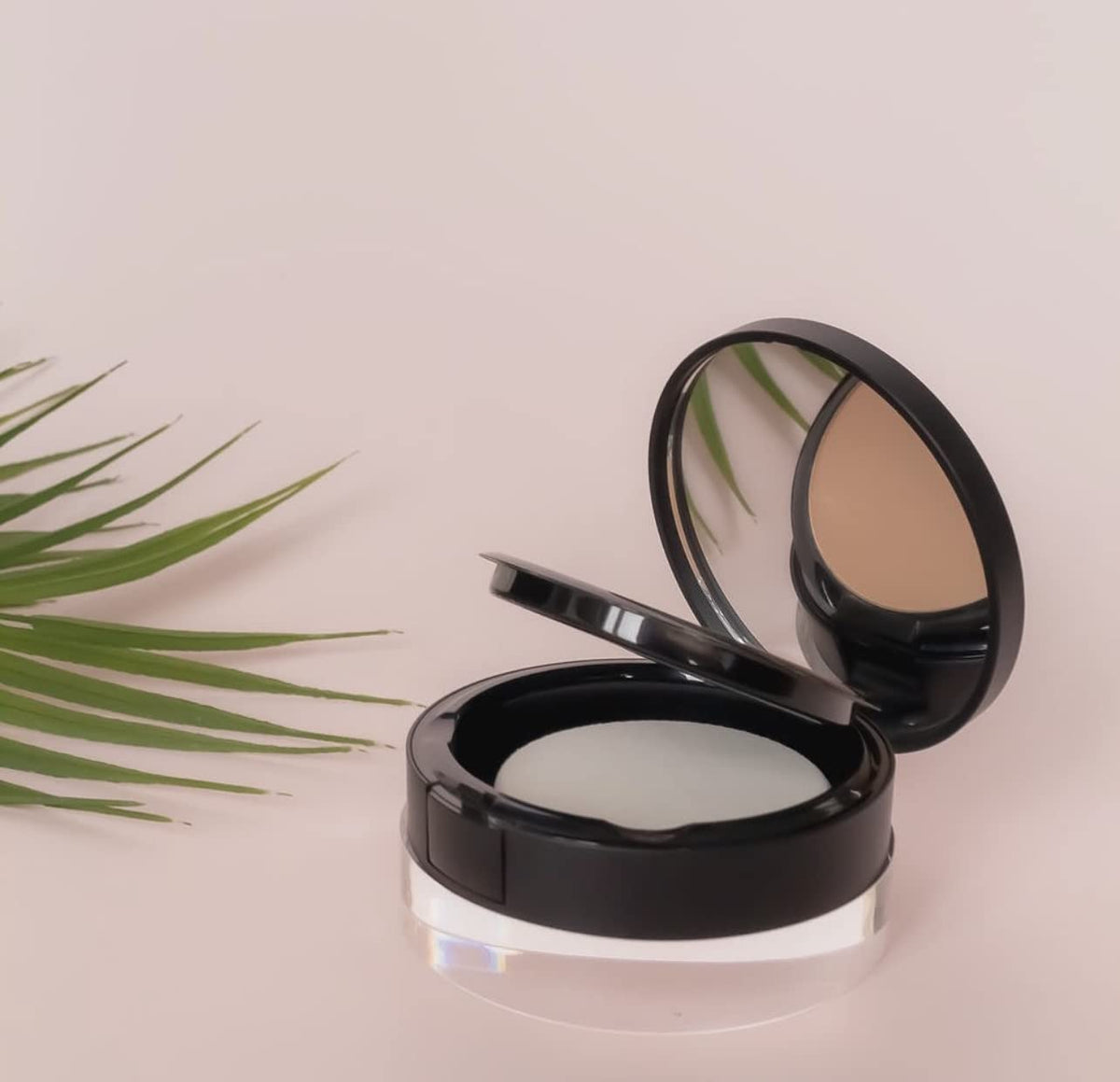 Gabriel Cosmetics Deep Beige Pressed Mineral Powder Foundation in makeup bag