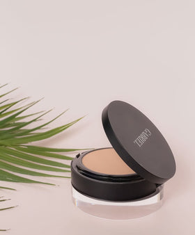 Gabriel Cosmetics Deep Beige Pressed Mineral Powder Foundation with natural lighting