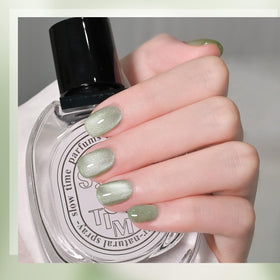 GAOY Green Cat Eye Gel Nail Polish on nails with glitter effect
