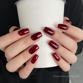 GAOY Jelly Red Gel Nail Polish curing under UV light