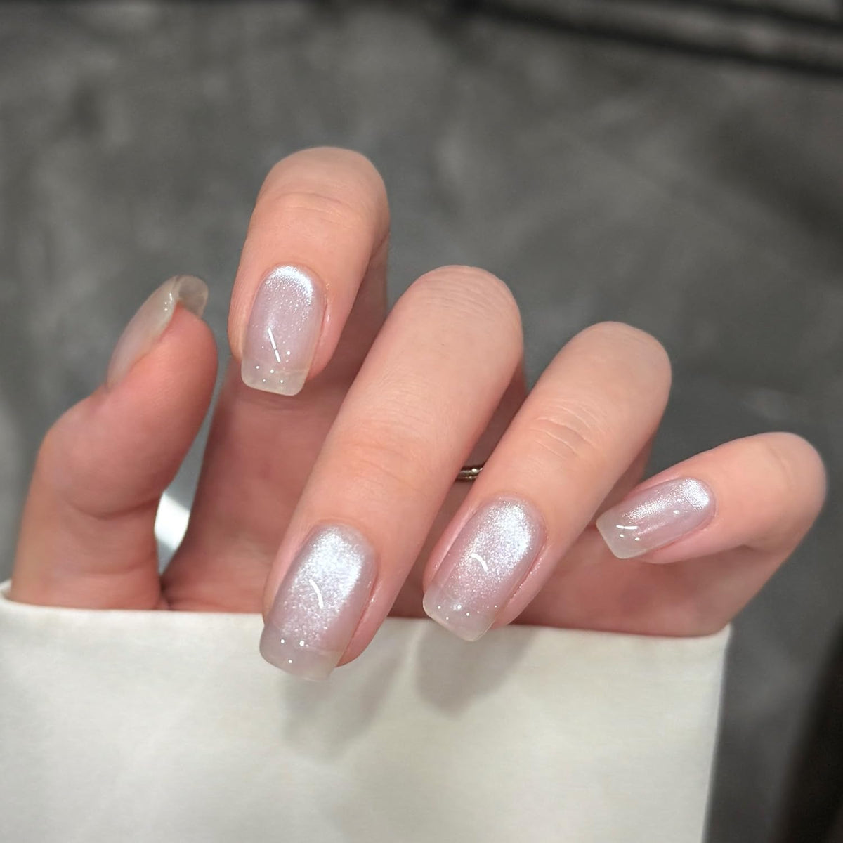 GAOY Silver Glassy Cat Eye Gel Nail Polish applied on nails