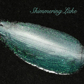 GAOY Teal Cat Eye Gel Nail Polish in lifestyle setting