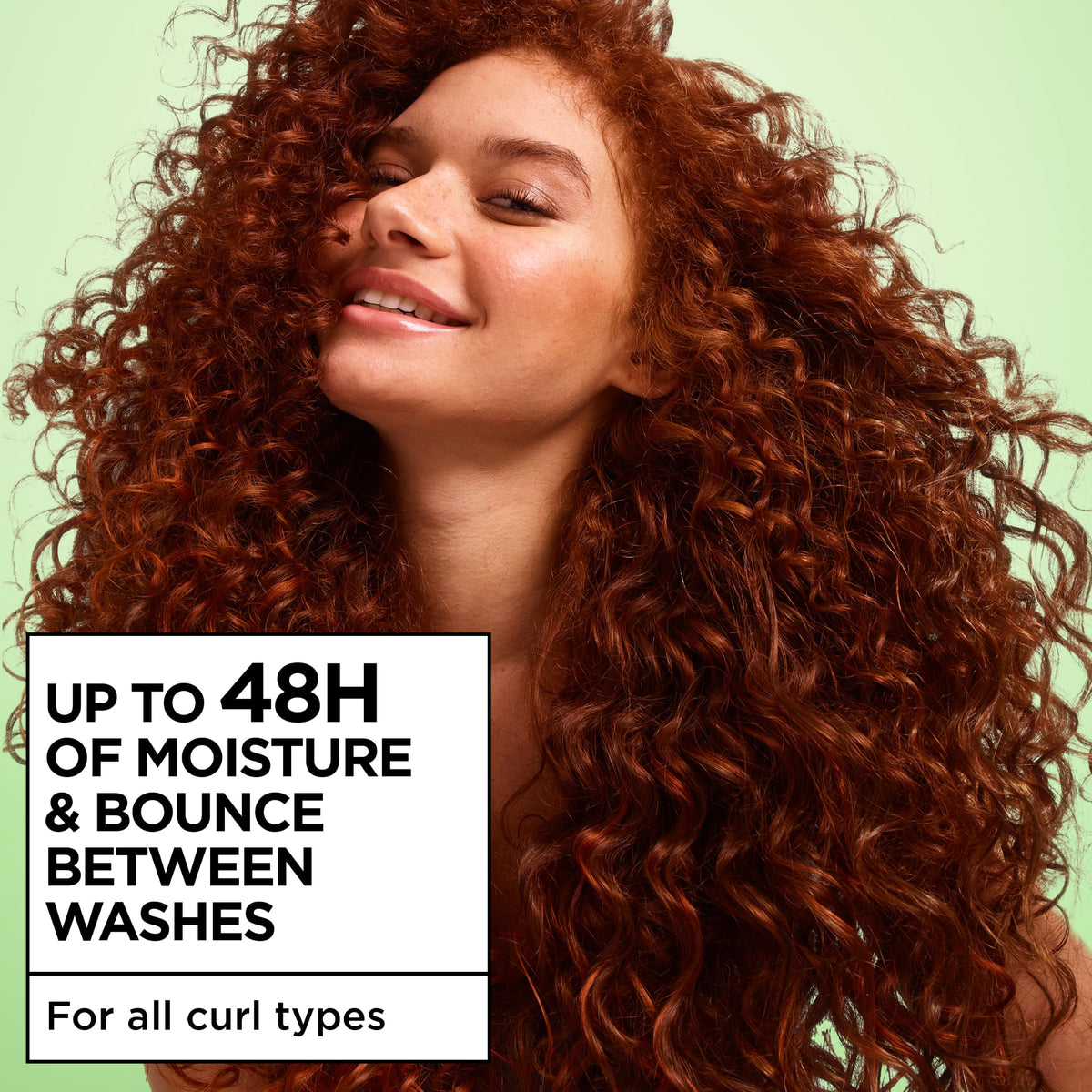Garnier Curl Refresher in lifestyle setting, showing application