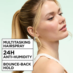 Garnier Fructis Style Hairspray packaging with three bottles