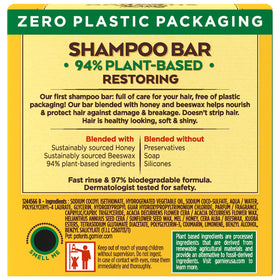 Garnier Whole Blends Restoring Shampoo Bar close-up showing texture