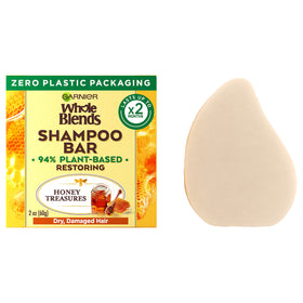 Garnier Whole Blends Restoring Shampoo Bar front view in packaging
