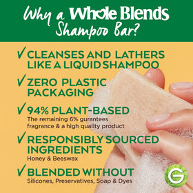 Garnier Whole Blends Restoring Shampoo Bar in a bathroom setting