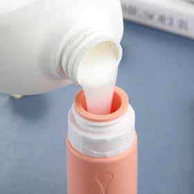 Gemice travel bottle with no-drip valve feature