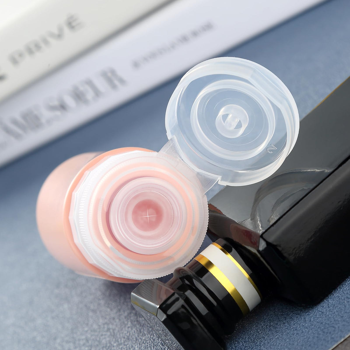 Gemice travel bottles set on a bathroom counter