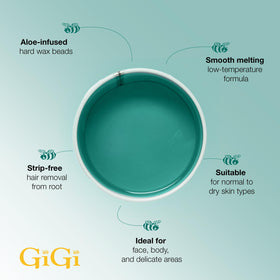 GIGI Hard Wax Beads application with spatula on skin