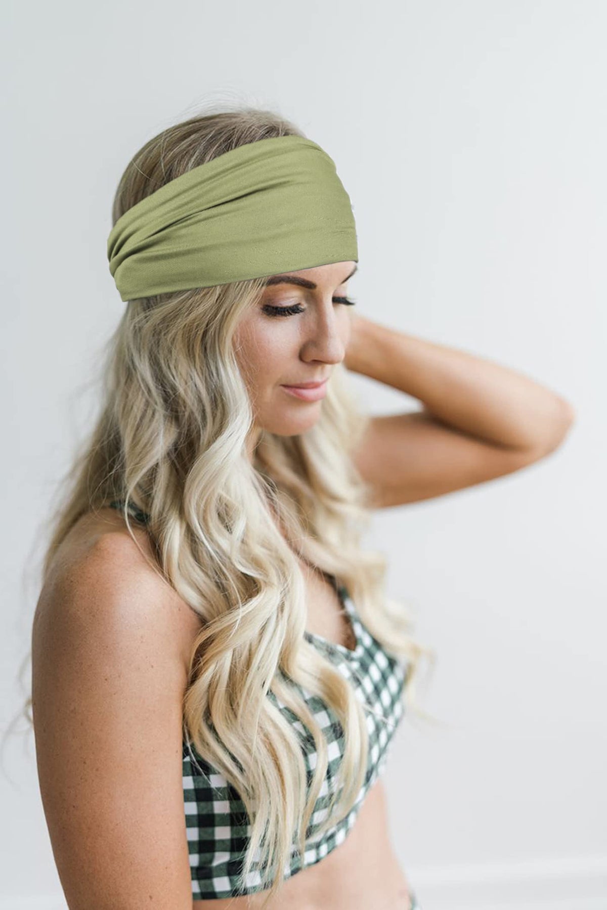 GiLi headband in green, folded to show versatility