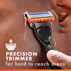 Gillette Fusion5 Power razor blades in hand for demonstration