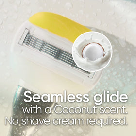 Gillette Venus Comfortglide women's razor with blade refills arranged